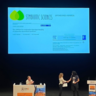 Jen McGaley receiving her award at ICOM 2024