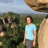 Trisna Tungadi on Kit Mikayi rock in Kenya when she worked with John Carr on a postdoctoral project in collaboration with bean growers in Kenya.