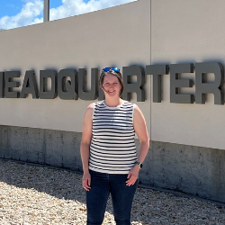Jen Bromley standing outside NASA Kennedy Space Centre head quarters