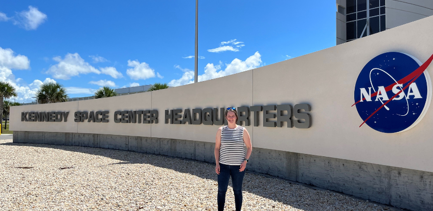 Jen Bromley standing outside NASA Kennedy Space Centre head quarters